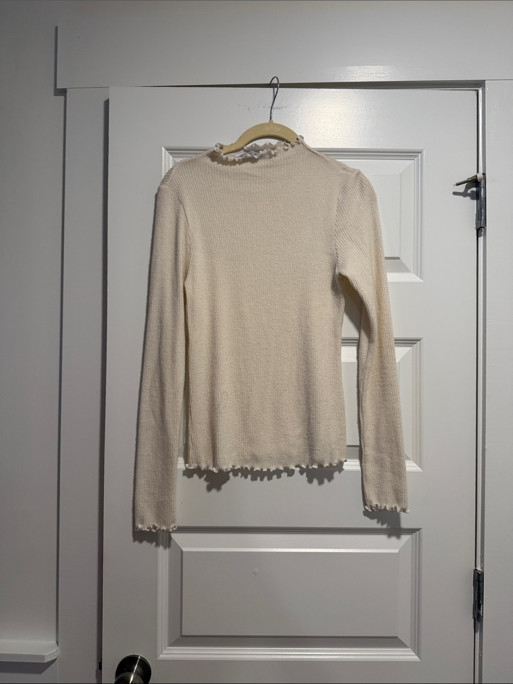 Cream Ruffle-Trim Long Sleeve Knit Top